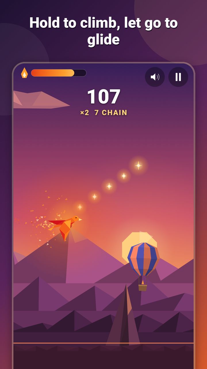 Glide gameplay: the ember kite flaps upward past a line of glowing sparks over sunset mountains, with a hot-air balloon below